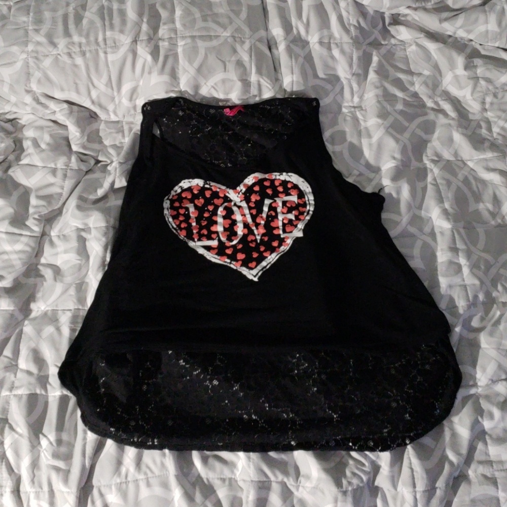Black crop top with the word love on it
